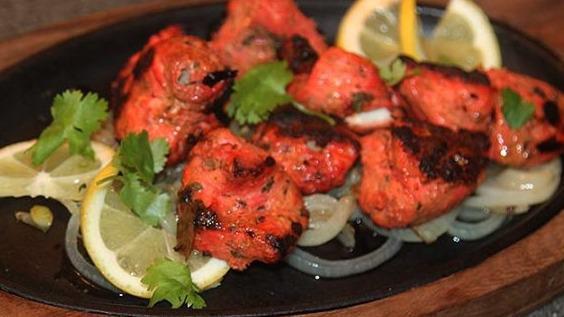 Grilled Tikka Appetizer · Tender 4 pcs boneless Chicken/Lamb, marinated in yogurt, mild spices, and herbs roasted in tandoor oven