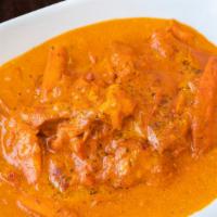 Butter Chicken · Choice of meat cooked in a special buttery tomato sauce with aromatic spices and herbs (Chic...
