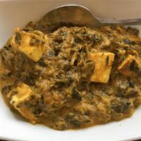 Saag Paneer · Fresh spinach cooked together with homemade cheese (paneer) in a special creamy sauce.
