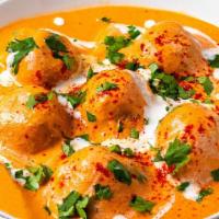 Vegetable Malai Kufta · Minced mixed vegetable and paneer balls cooked in the chef’s special creamy sauce with aroma...