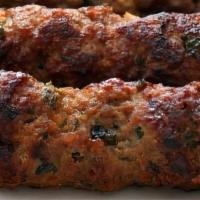 Sheekh Kabab Entree · Finely minced Chicken/Lamb mixed with freshly ground aromatic herbs and spices then grilled ...