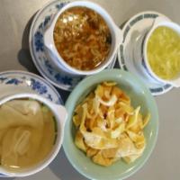Egg Drop Soup · Chicken and egg based broth soup
comes with one bag of won ton chips on the side.