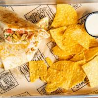 West Coast Burrito · A flour tortilla rolled and stuffed with grilled chicken, fries, shredded cheese, fresh lime...