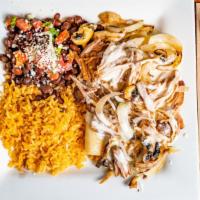 One Night Enchilada · Two corn cheese enchiladas topped with queso dip and carnitas mixed with mushrooms and onion...