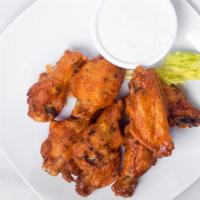 Chicken Wings · Our wings are marinated 24 hours with lemon juice, olive oil, kosher salt, black pepper, ore...