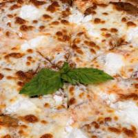 Eggplant Parm Pizza · Breaded Eggplant topped with Marinara sauce and Mozzarella Cheese.