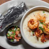 Jinete Dip · Cheese dip with steak, chicken and shrimp. Served with two tortillas.