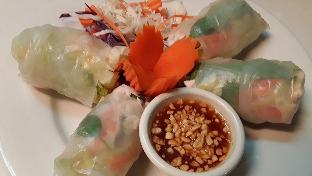 Fresh Roll · Chicken, shrimp, scallion, lettuce, basil, cucumber, and bean sprout, wrapped with rice paper. Served with sweet chili sauce and ground peanut.