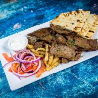 Lamb Gyro Platter · Shaved Lamb Gyro Meat served w/ Sliced Tomatoes, Sliced Onions, Pita, Tzatziki Sauce, Greek ...