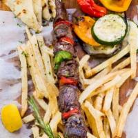Churrasco Skewer Platter · Served w/ Pita Bread, Greek Fries, Grilled Veggies & Tzatziki Sauce
