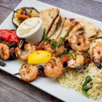 Shrimp Skewer Platter · 2 skewers with pita bread, spinach & onion orzo, lemon aioli and grilled veggies