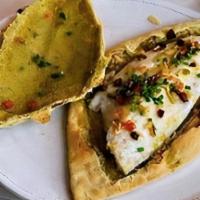 Branzino · Baked branzino filet in mixed fresh herbs salted dough.

Consuming raw or undercooked meats,...