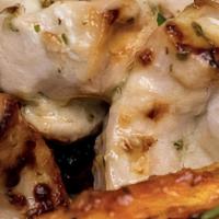 Chicken Malai Kabob · Tenderized chicken seasoned with a mouth watering cardamom, garlic, ginger masala grilled fr...