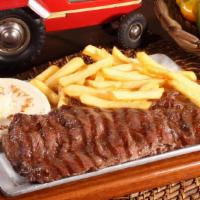 Carne Asada / Grilled Steak · Carne asada servida con papa francesa y arepa con queso/ Grilled meat served with fries and ...