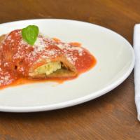 Eggplant Rollatini · Thin slices of eggplant lightly breaded, ricotta, parmesan and tomato sauce