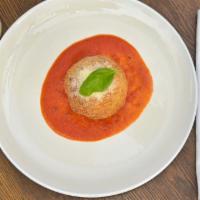 Arancini  · Ball stuffed with risotto, mozzarella, meat sauce & coated with bread crumbs