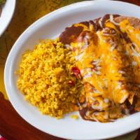 Two Enchiladas · Delicious chunky beef, chicken or cheese rolled and stuffed in two corn tortillas, topped wi...