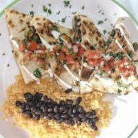 Steak Quesadilla · A large flour tortilla stuffed with Monterey jack cheese, cheddar cheese and pieces of sirlo...