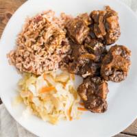 Oxtails (Large) · Comes with rice and peas white rice or yellow rice and two plantain slices.