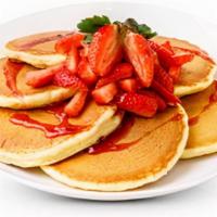 Strawberry Pancakes · 6 buttermilk pancakes topped with fresh strawberries,. whipped cream, powdered sugar and hom...