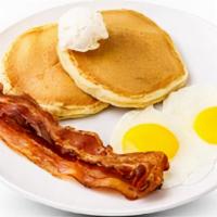 Two By Two By Two · 2 eggs any style, 2 buttermilk pancakes and your. choice of 2 bacon strips or 2 sausage links.