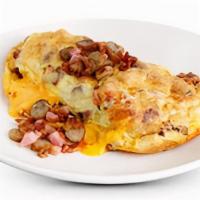 Ham And Mushroom Omelette · Diced ham, mushrooms and mozzarella cheese. Served with Pancakes or Toast.