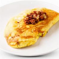 Irish Omelette · Secret corned beef hash recipe & Swiss cheese. Served with Pancakes or Toast.