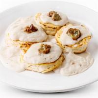 Biscuits And Gravy · 2 piece buttermilk biscuits smothered with creamy sausage gravy.