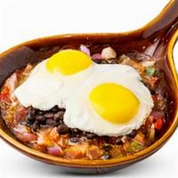 Huevos Rancheros · 2 eggs any style topped with sauteed tomatoes, peppers, onions, and black beans. Garnished w...