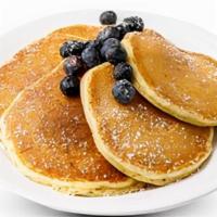Blueberry Pancakes · 6 buttermilk pancakes filled with blueberries. topped with fresh blueberries and powdered. s...