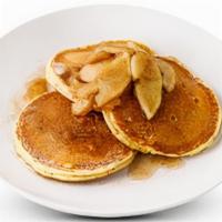 Cinnamon Apple Pancakes · 6 buttermilk pancakes topped with cinammon and caramelized apples. Served with warm apple sy...