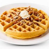 Pecan Waffle · Belgian waffle filled with pecans topped with more pecans and dusted with powdered sugar.