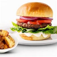 Impossible Burger · A juicy Impossible� burger made from plants served on a Challah roll with lettuce, tomato an...