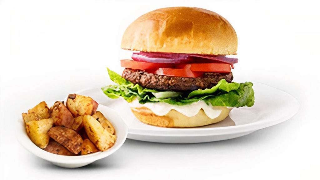 Impossible Burger · A juicy Impossible� burger made from plants served on a Challah roll with lettuce, tomato and red onion. Served with your choice of potatoes.