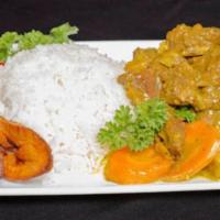 Curry Chicken · Di jamaican curry chicken. served with rice and your choice of side order.