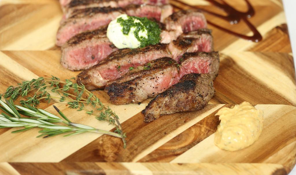 Ribeye Steak · Boneless ribeye 14 oz. May contain raw or undercooked ingredients. Consuming raw or undercooked ingredients may increase your risk of food-borne illness.