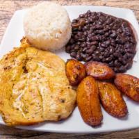 Pollo A La Plancha · Grilled chicken, served with rice, black beans and plantain.