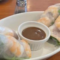Goi Cuon / Summer Rolls · Pork, shrimp, noodles, lettuce and mint rolled in rice paper, served with peanut sauce.