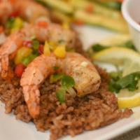 Shrimp Creole · Featuring sauteed shrimp with creole sauce. Served with dirty rice and seasonal vegetables.