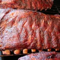 Rib Sandwich · 4 Bones Spareribs smoked to perfection with Hickory and Red Oak Wood
