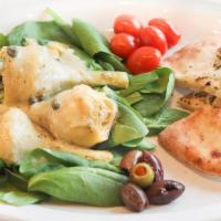 Roman Artichoke Salad · Roasted roman artichokes, olives & tomatoes topped with a hot lemon butter caper dressing se...