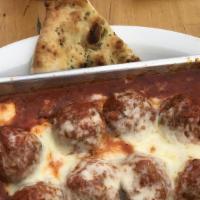 Spicy Meatballs Plate · Oven baked meatballs in our spicy marinara & calabrese oil sauce topped with mozzarella chee...