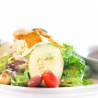 Garden Salad · Mixed greens, grape tomatoes, cucumbers, mixed olives, red onions, croutons & mozzarella che...