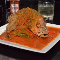 Creole Red Snapper · Whole Red Snapper seasoned & deep fried to perfection. Smothered in a creole sauce, served a...