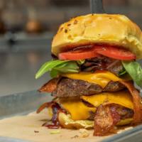 Renegade · Double stacked six ounces burgers, cheddar cheese, bacon, BBQ sauce, crispy onions, spring m...