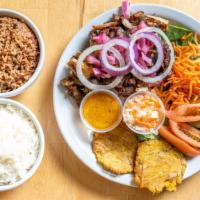 Fried Goat · Tender fried goat served with your choice of white rice, or rice and beans, salad, and fried...