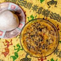 Vegan - Egusi (Melon Gourmet) With Fufu Or Rice · Egusi (melon gourmet) made with spinach, indigenous roasted African melon seeds, onions, gar...