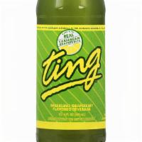 Ting - Jamaican Drink · Ting -  Sparkling Grapefruit Soda, tart and sweet. A popular Jamaican drink.