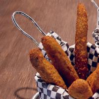 Fried Pickle Chips · Hand-breaded dill pickle chips, fried & served with our house-made ranch or Captain’s sauce