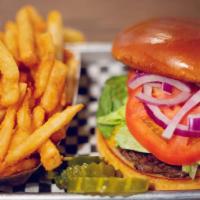 The American Classic Burger · to order & topped with lettuce, tomato, onion & Our handcrafted classic sirloin burger cooke...